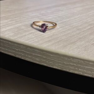 Elegant Gold and Purple Gemstone Ring